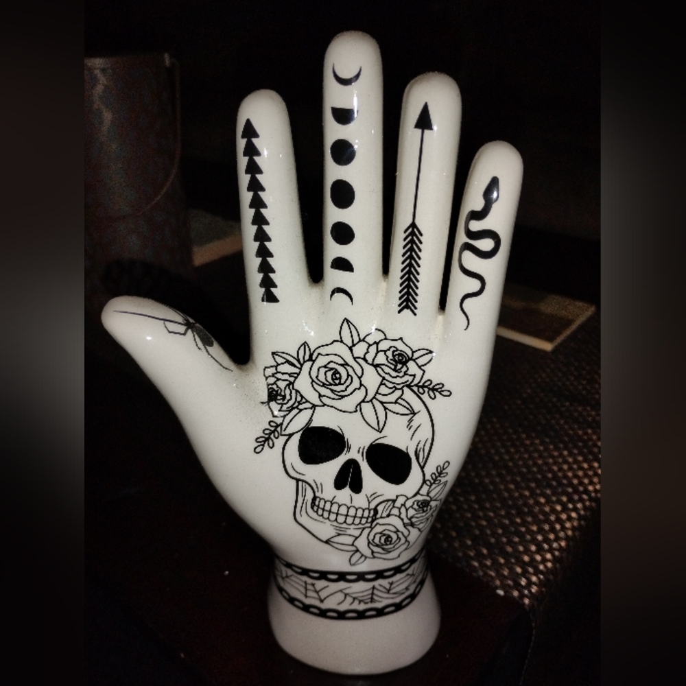 Decorative Ceramic Hand with Black Skull Design